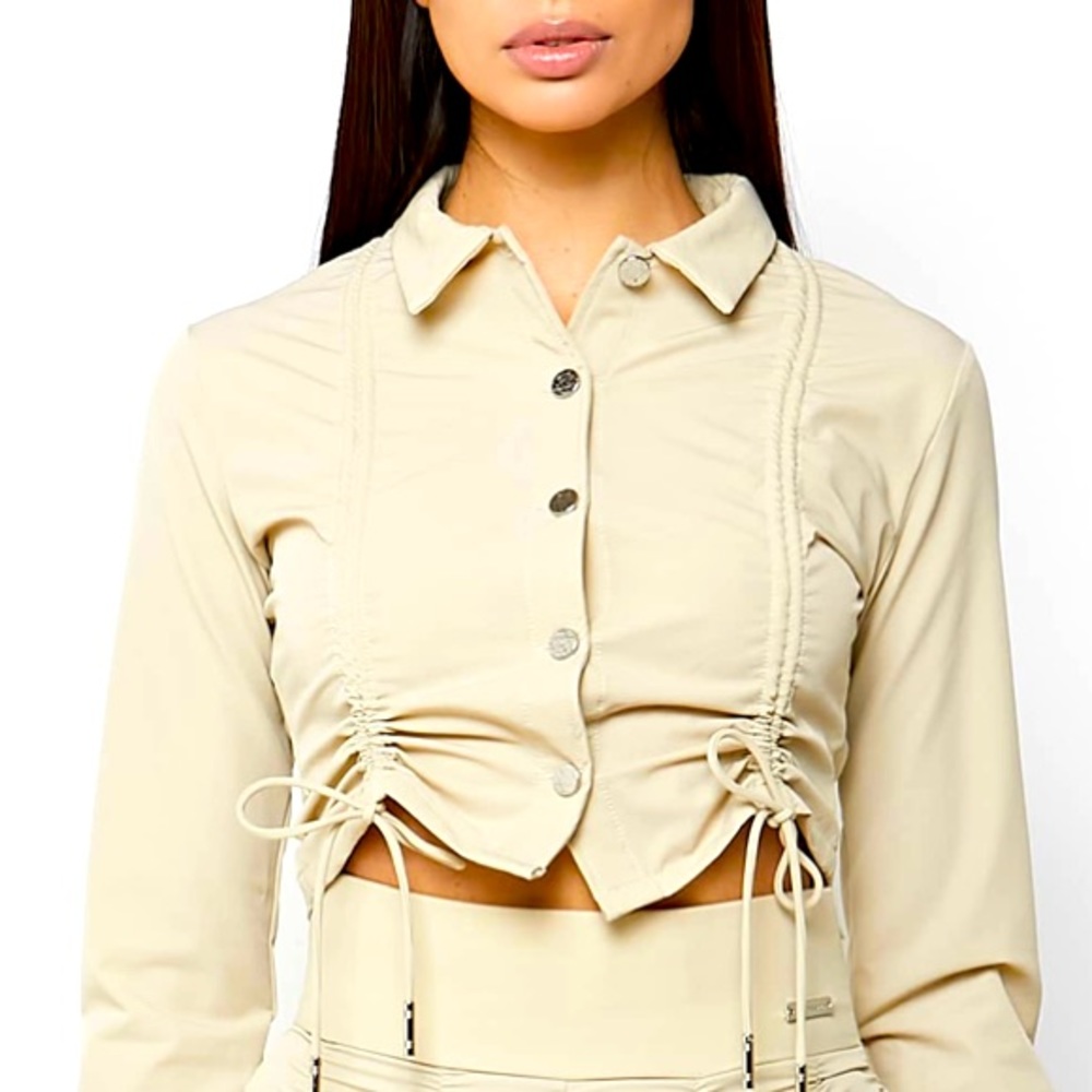 Brand new rutched long sleeve blouse.